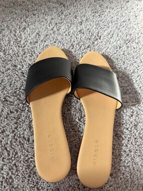 Nisolo Black Slide Sandals with Tan Footbed